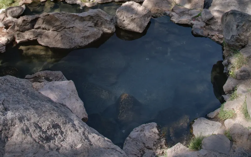 A rock-lined pool at Spence Hot Spring in the Jemez Mountains