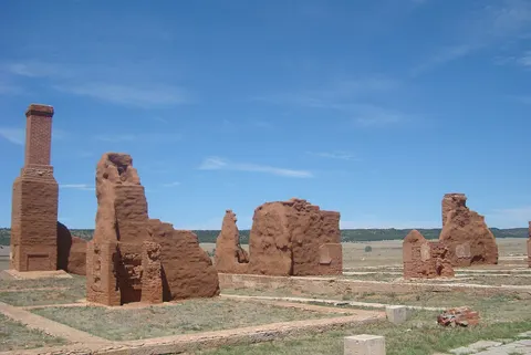 Adobe walls and chimneys of the officers' quarters at Fort Union