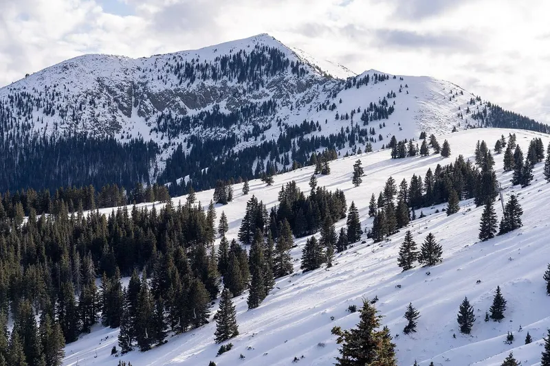 Snow-covered Sierra Blanca Peak seen from the Ski Apache gondola